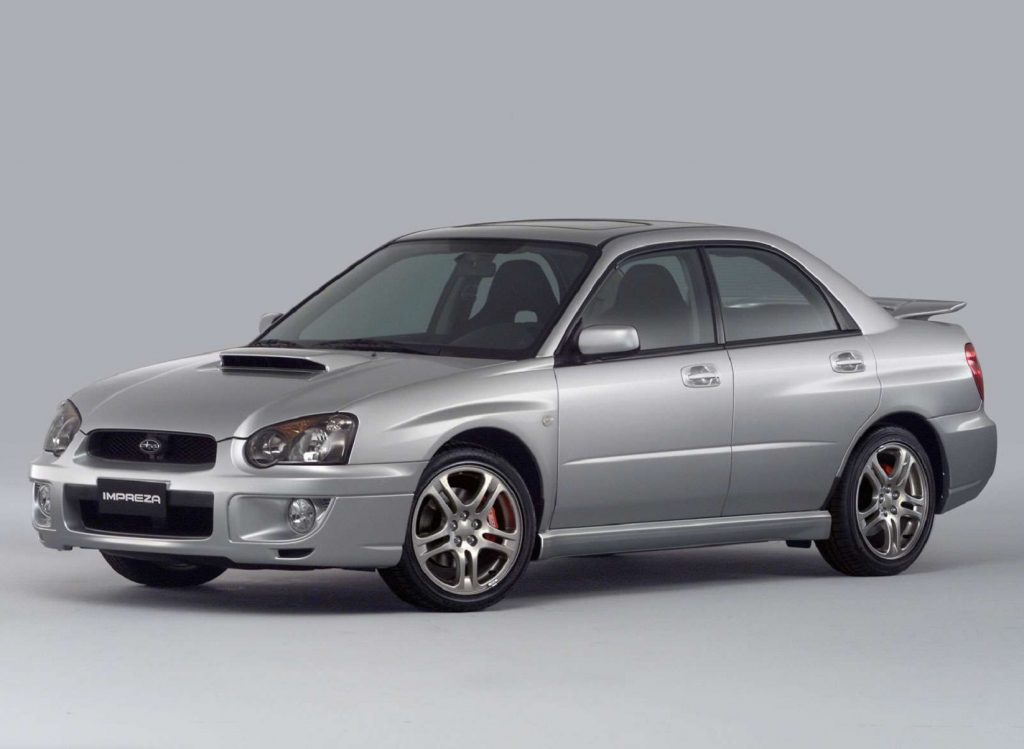 A silver 2004 Subaru Impreza WRX sedan