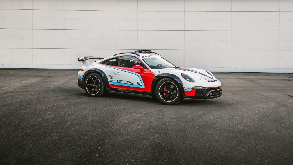 The white-red-and-blue 2012 Porsche 911 Vision Safari