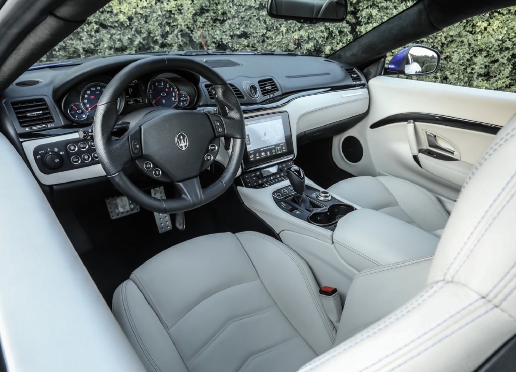 The white-leather-upholstered 2018 Maserati GranTurismo's interior