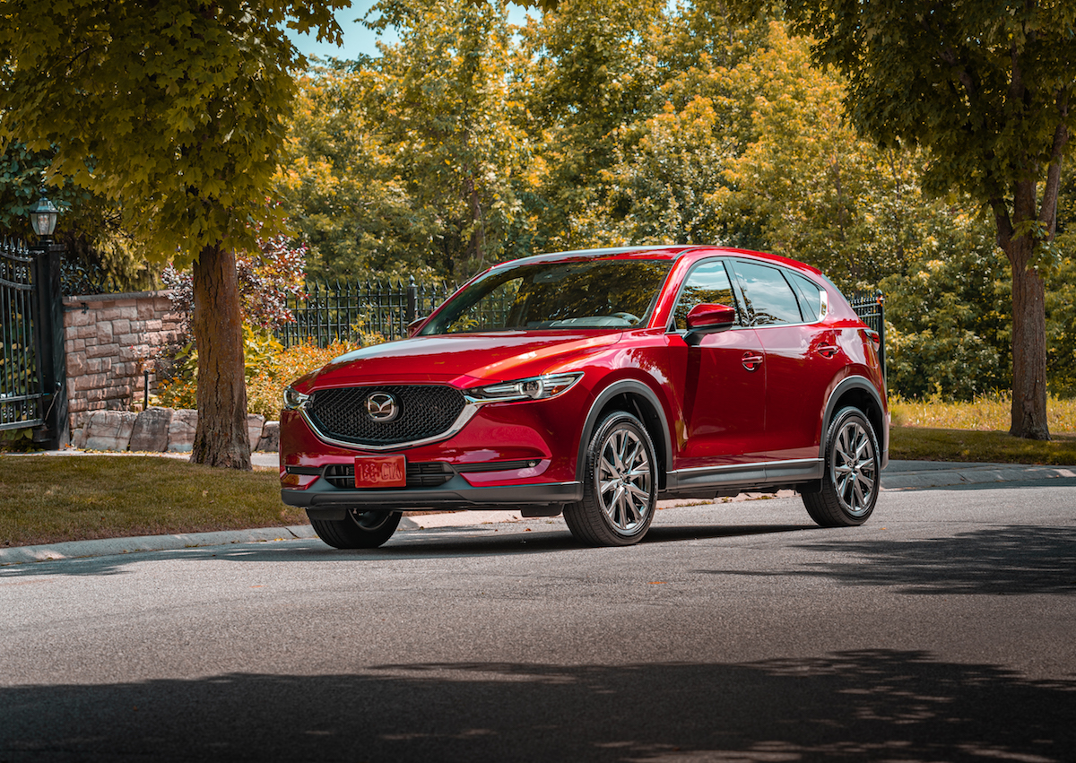 An image of a red Mazda CX-5 parked outside.