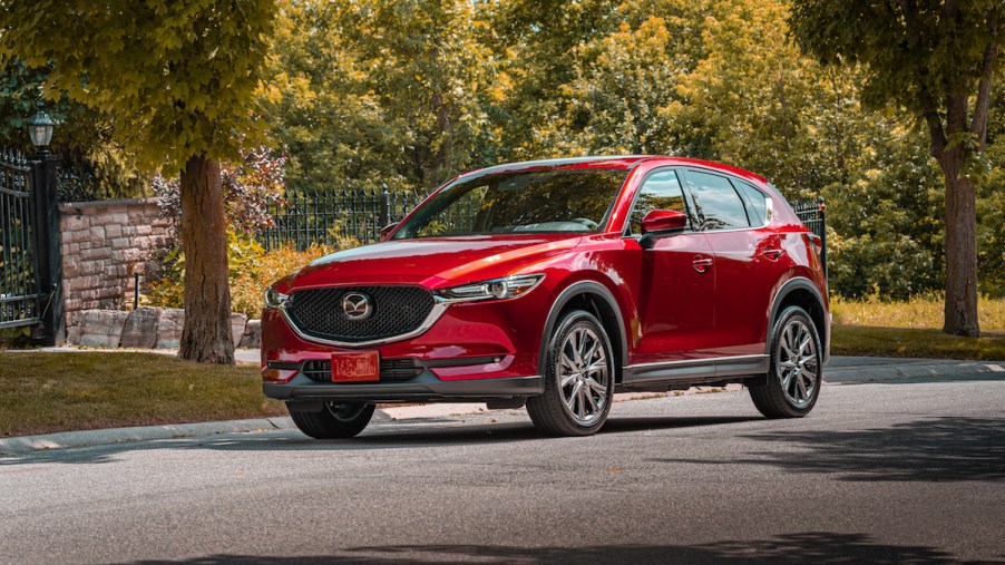 An image of a red Mazda CX-5 parked outside.