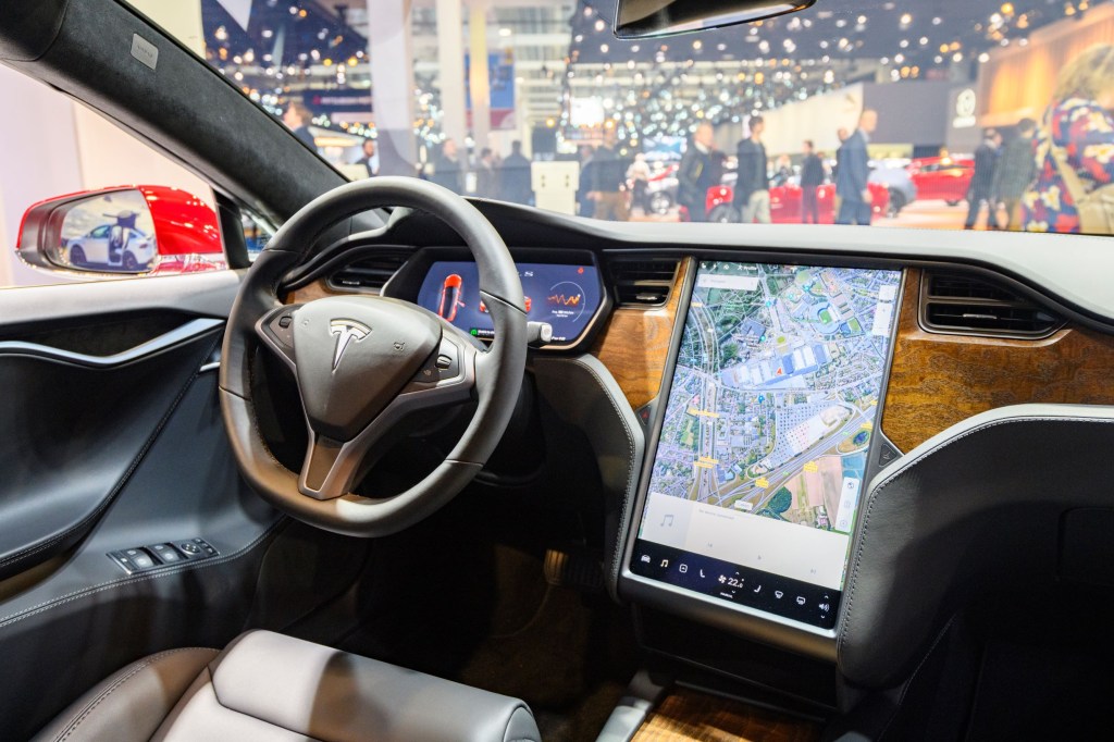 The 2020 Tesla Model S's wood-look dashboard and central screen