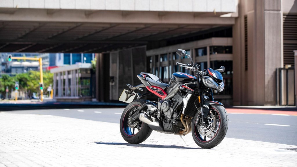 A black-and-red 2020 Triumph Street Triple R on a city street