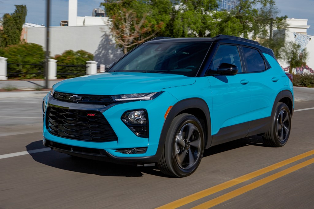 new cars like this blue 2021 Chevy Trailblazer driving down a city street have available wifi subscription options