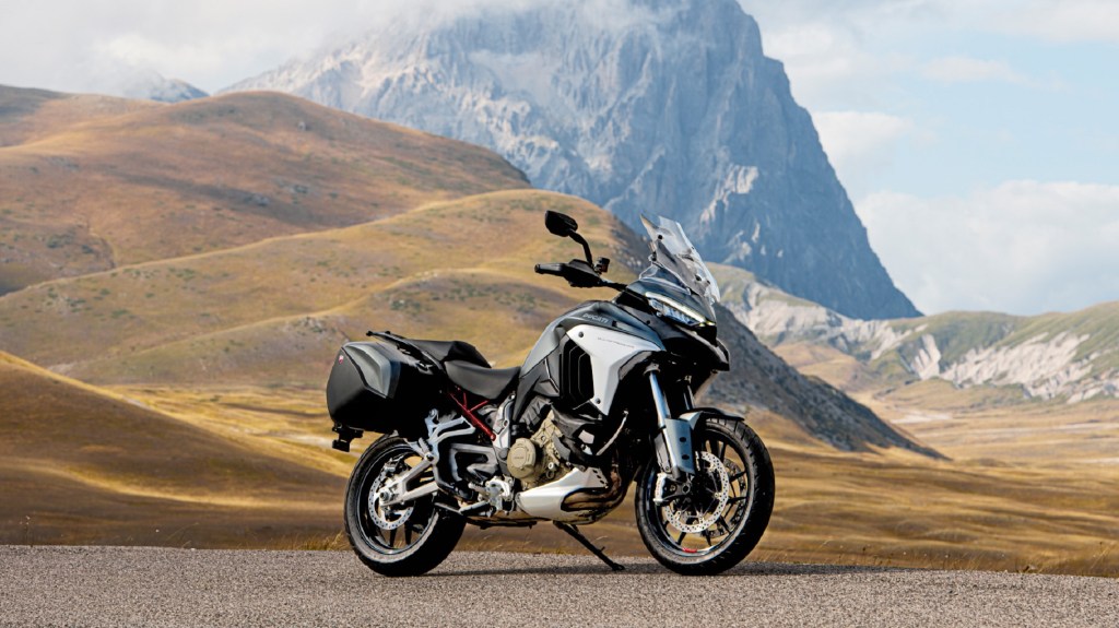 A gray-and-black 2021 Ducati Multistrada V4 S in front of a mountain