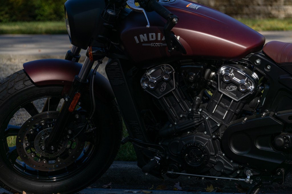 The front half of a maroon 2021 Indian Scout Bobber