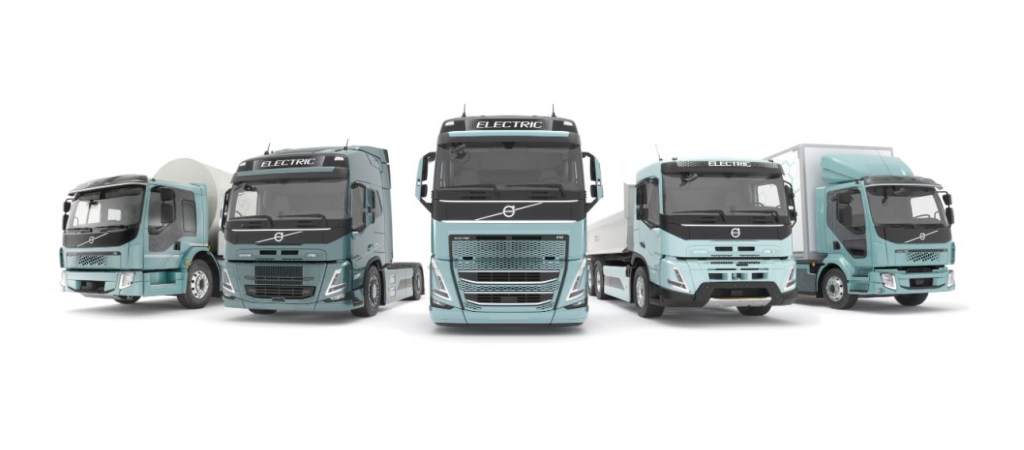 Five heavy-duty trucks are lined up to represent Volvo's all-electric offerings.