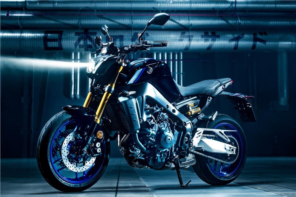 A black-and-blue 2021 Yamaha MT-09 SP in a warehouse