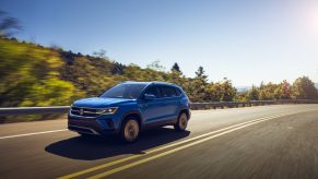 The 2022 Volkswagen Taos driving on a road