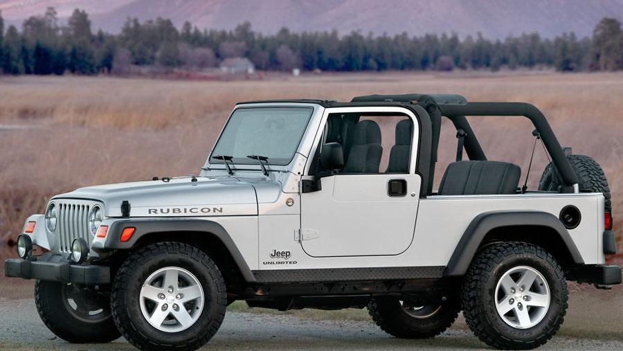 a 2006 model year wrangler parked int he desert with the top down