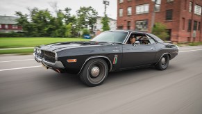 A photo of a 1970 Dodge Challenger on the road.