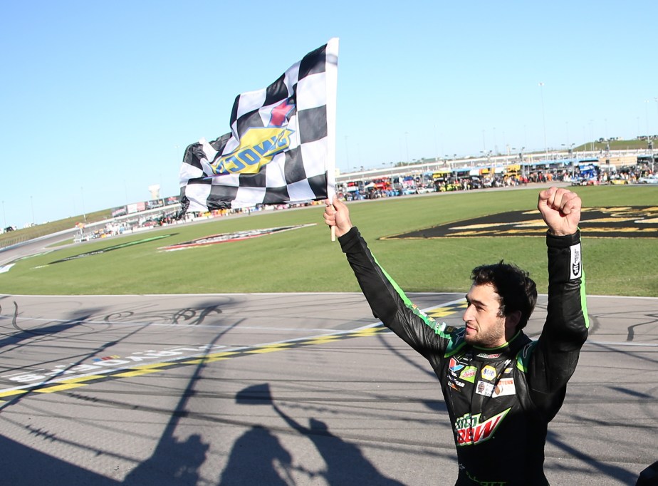 Chase Elliott celebrates a NASCAR race win.