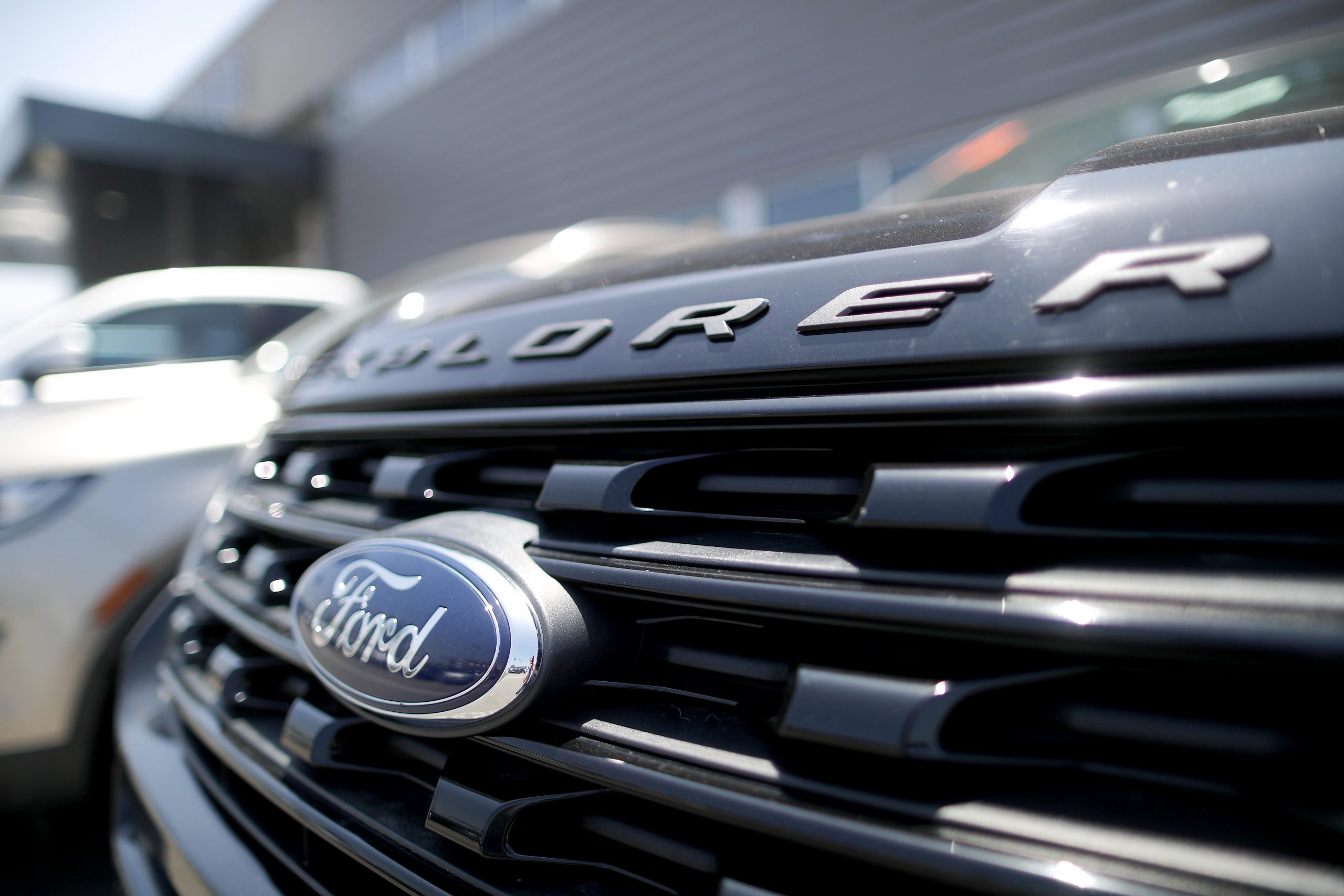 A close up photo of a Ford Explorer's grille