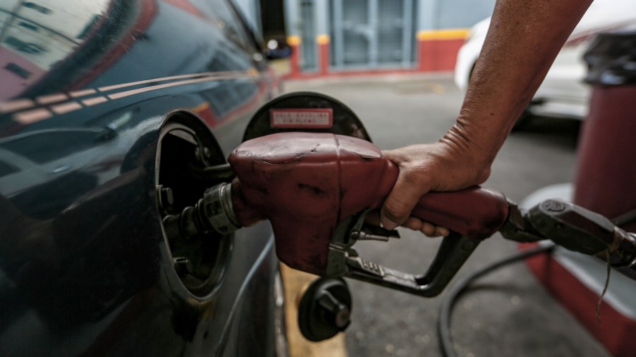 A car is refuelled at a filling station during the ongoing fuel shortage.