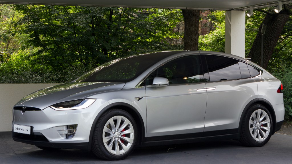 An image of a Tesla Model X parked outdoors.