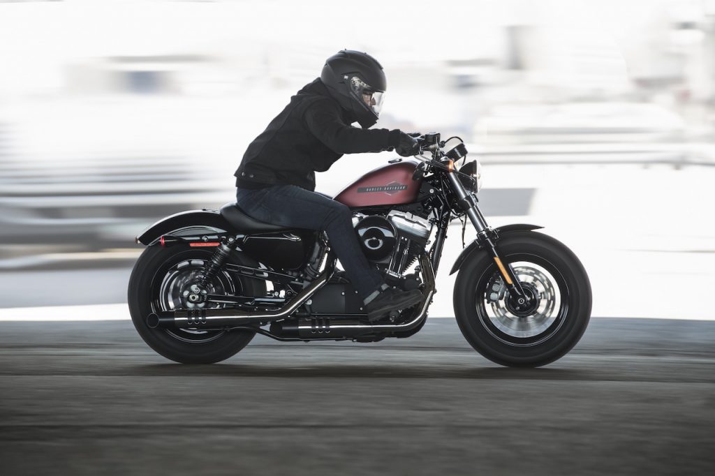 A photo of a Harley-Davidson Sportster on the road.