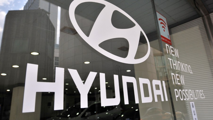 The Hyundai logo printed on a window