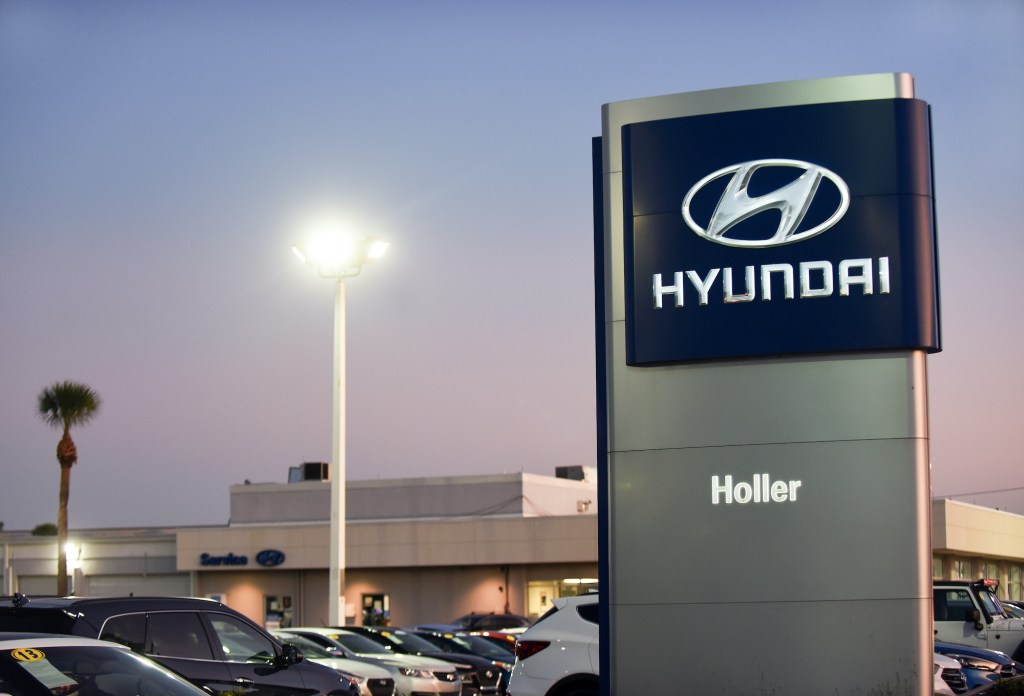 Cars are seen at a Hyundai car dealership. Hyundai and Kia announced on October 11, 2019 that they have agreed to settle a class action lawsuit over engine fireshttps://www.motorbiscuit.com/the-hyundai-veracruz-walked-so-the-hyundai-santa-fe-could-run/