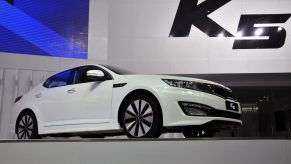 A Kia K5 being debuted in China
