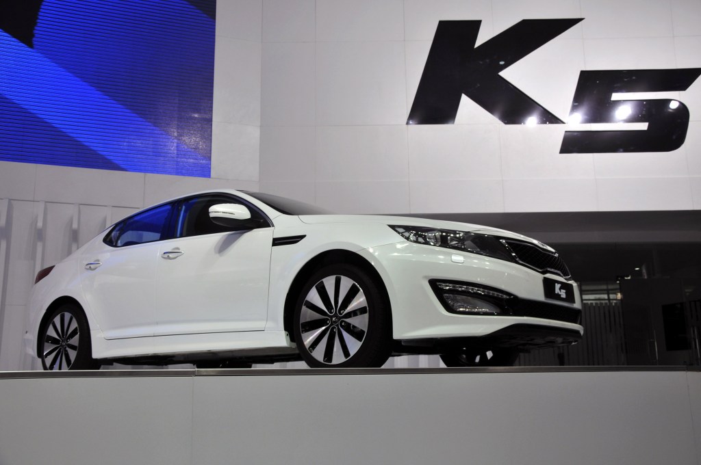 A Kia K5 being debuted in China