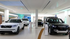 A Land Rover showroom with SUVs on display