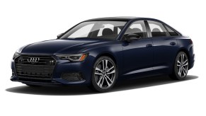 A blue 2021 Audi A6 on display with a white background