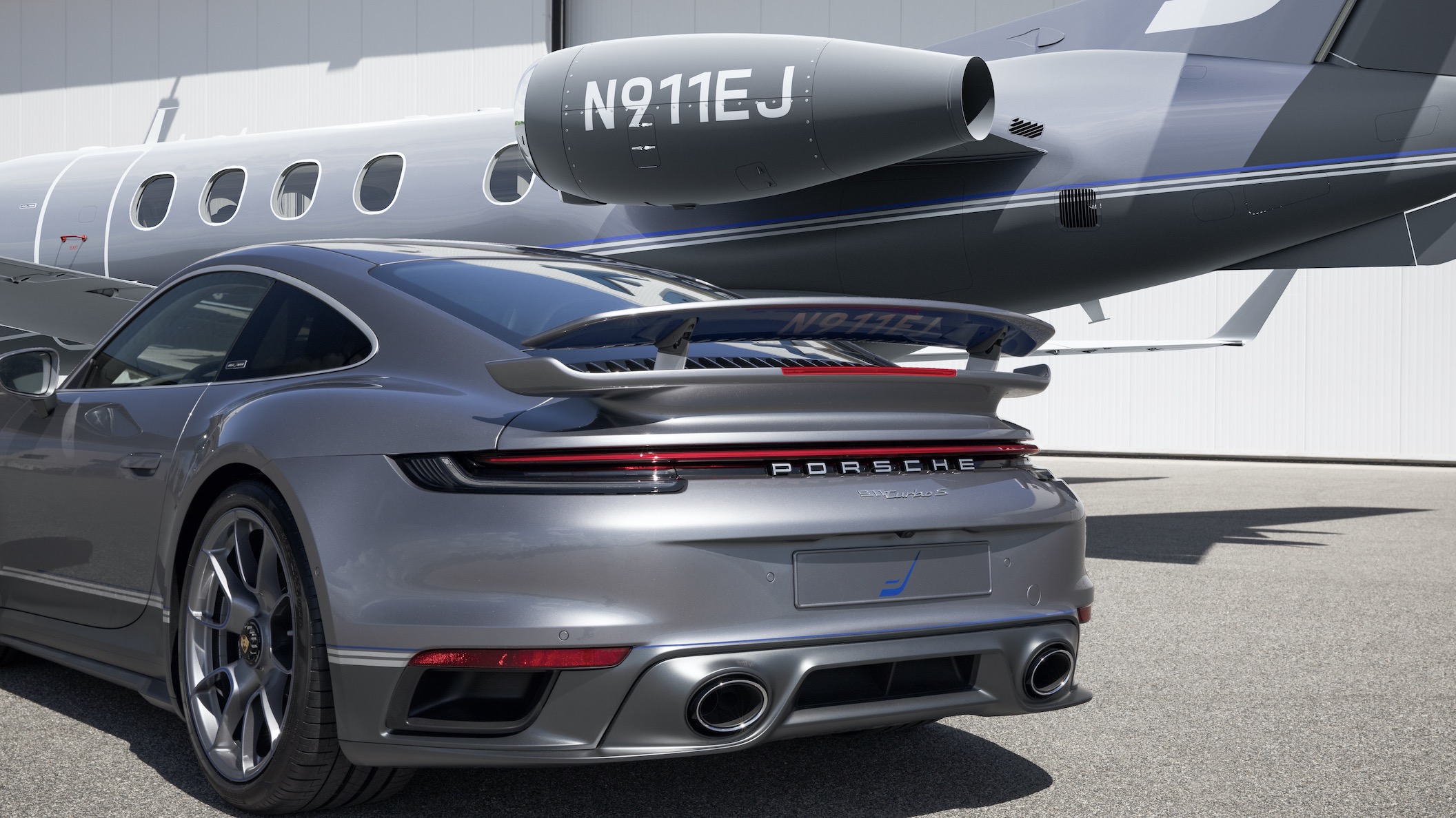 Porsche 911 Turbo S and Embraer Jet
