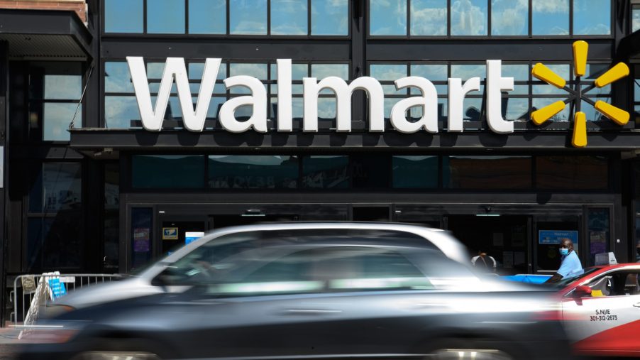Cars drive past a Walmart store in Washington, DC