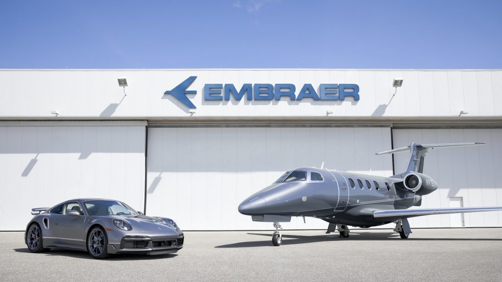 Porsche 911 Turbo S and Embraer Jet