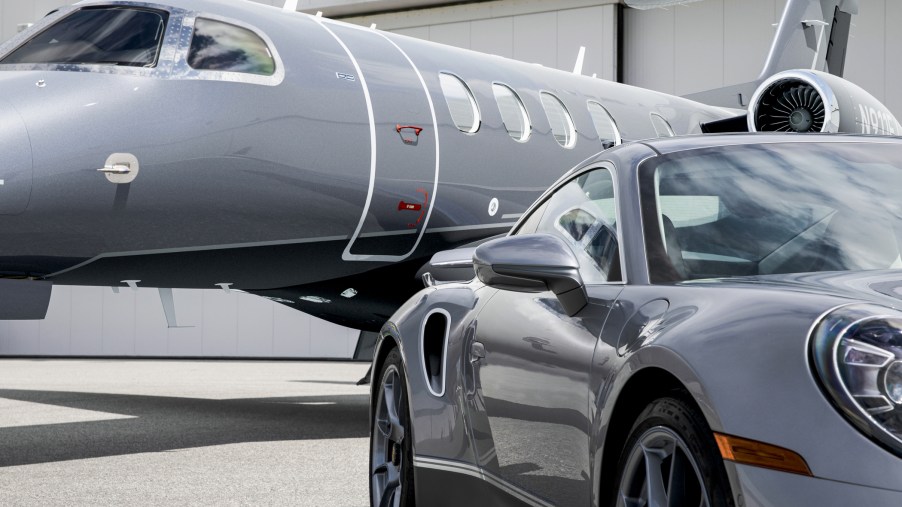 Porsche 911 Turbo S shares two-tone paintwork and elegant details with an Embraer jet.