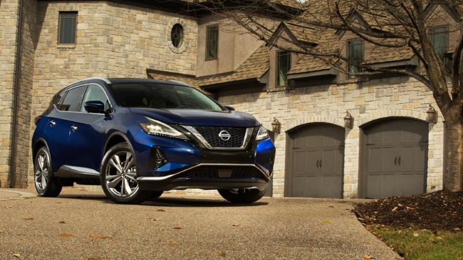 2021 Nissan Murano parked in front of an affluent home
