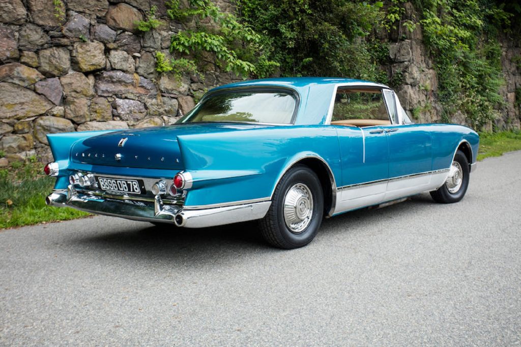 The rear 3/4 view of a teal 1961 Facel Vega Excellence EX1