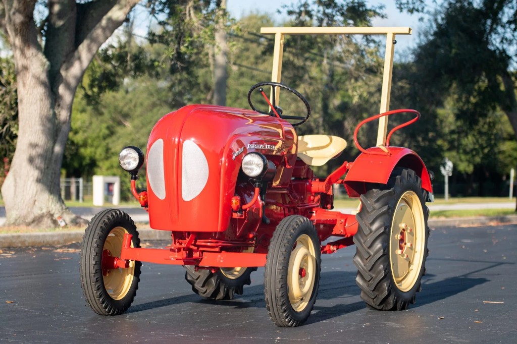 A red 1961 Porsche Junior 108 diesel tractor
