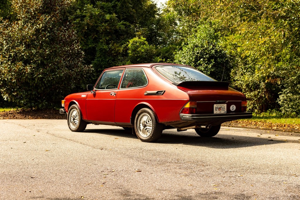 The rear 3/4 view of a red 1978 Saab 99 Turbo
