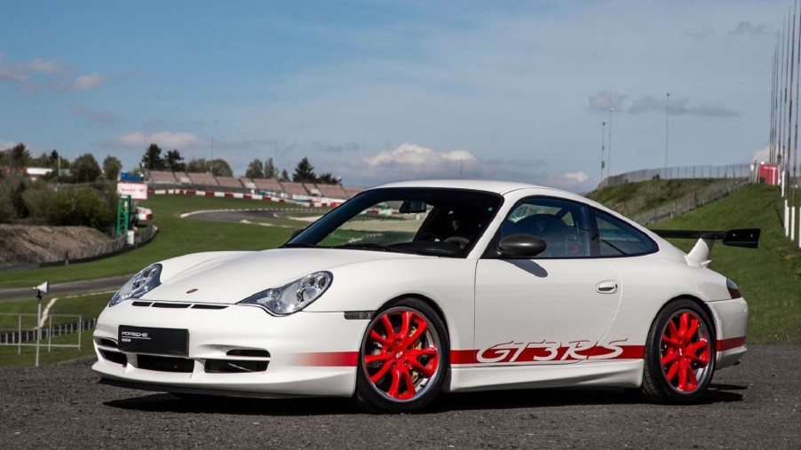 A white-and-red 2004 Porsche 911 GT3 RS