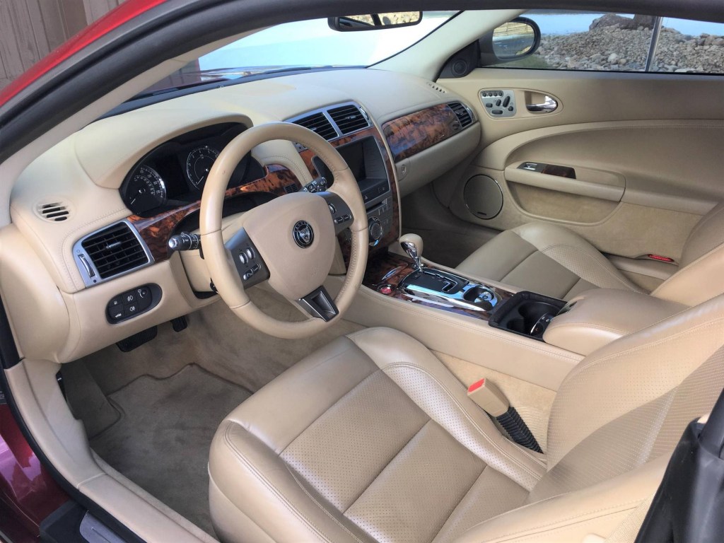 The tan-leather-upholstered 2008 Jaguar XK's interior