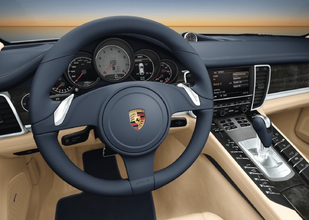 The 2010 Porsche Panamera's steering wheel, gauge cluster, and center console
