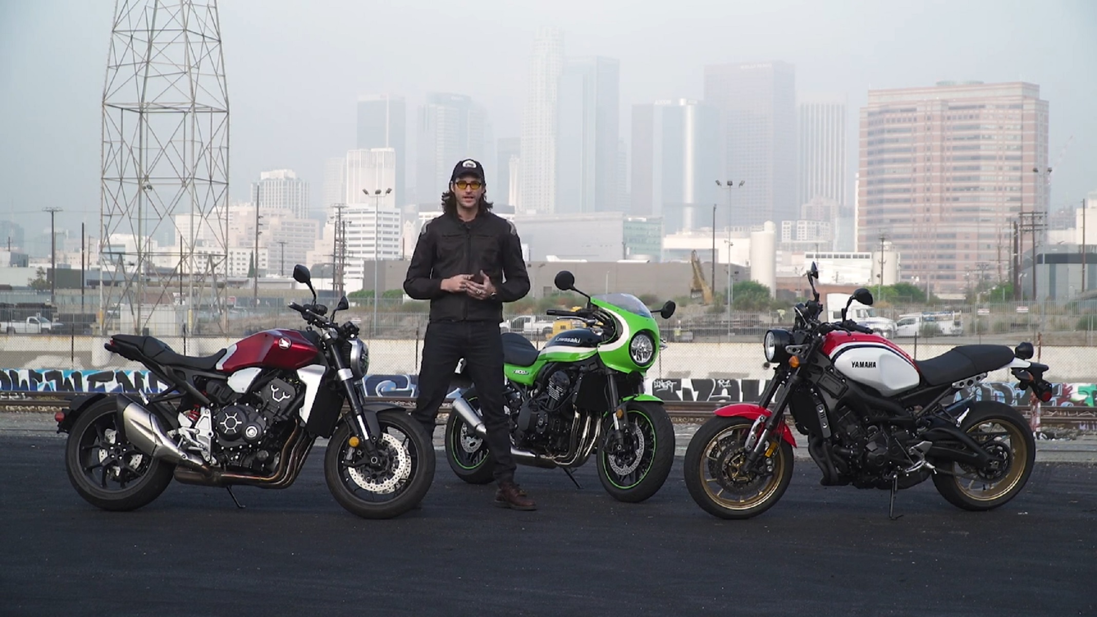 A red 2019 Honda CB1000R next to a green-and-white 2020 Kawasaki Z900RS Cafe next to a red-and-white 2020 Yamaha XSR900
