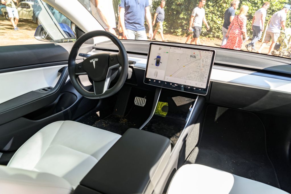 2019 Tesla Model 3 interior with its large central touchscreen