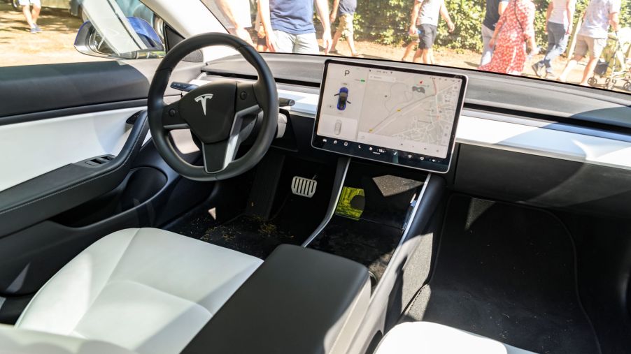 2019 Tesla Model 3 interior with its large central touchscreen