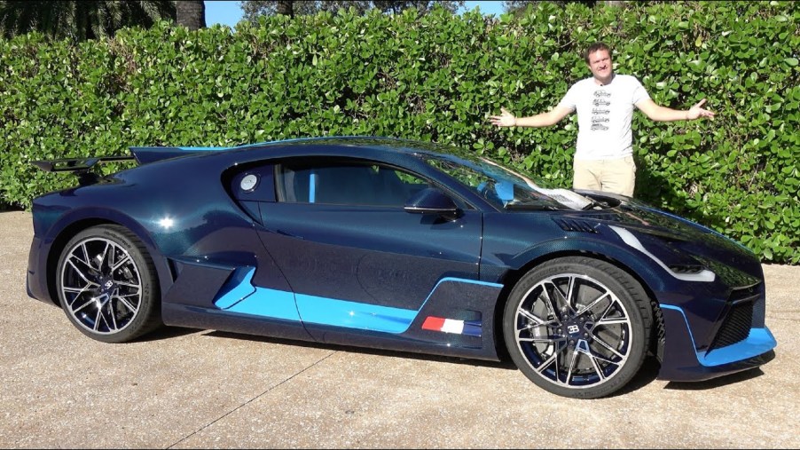 Doug Demuro with a blue 2020 Bugatti Divo