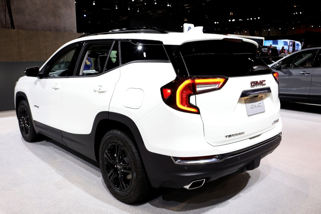 A white 2020 GMC Terrain on display at an autoshow