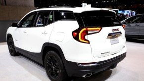 A 2020 GMC Terrain on display at an auto show