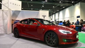 A dark-red 2020 Tesla Model S is displayed during the London Motor and Tech Show at ExCel on May 16, 2019, in London, England