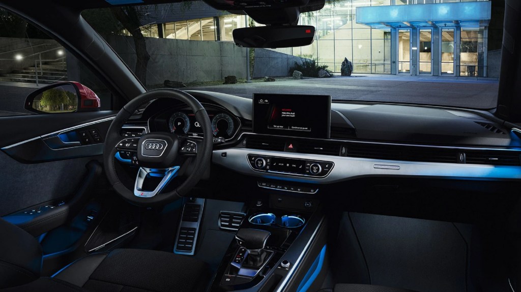 The 2021 Audi A4's blue-lit front seats and dashboard