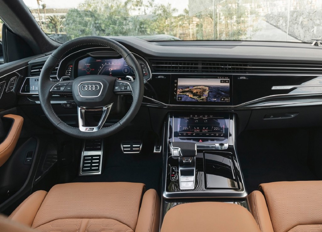 The 2021 Audi RS Q8's tan leather front seats and black dashboard