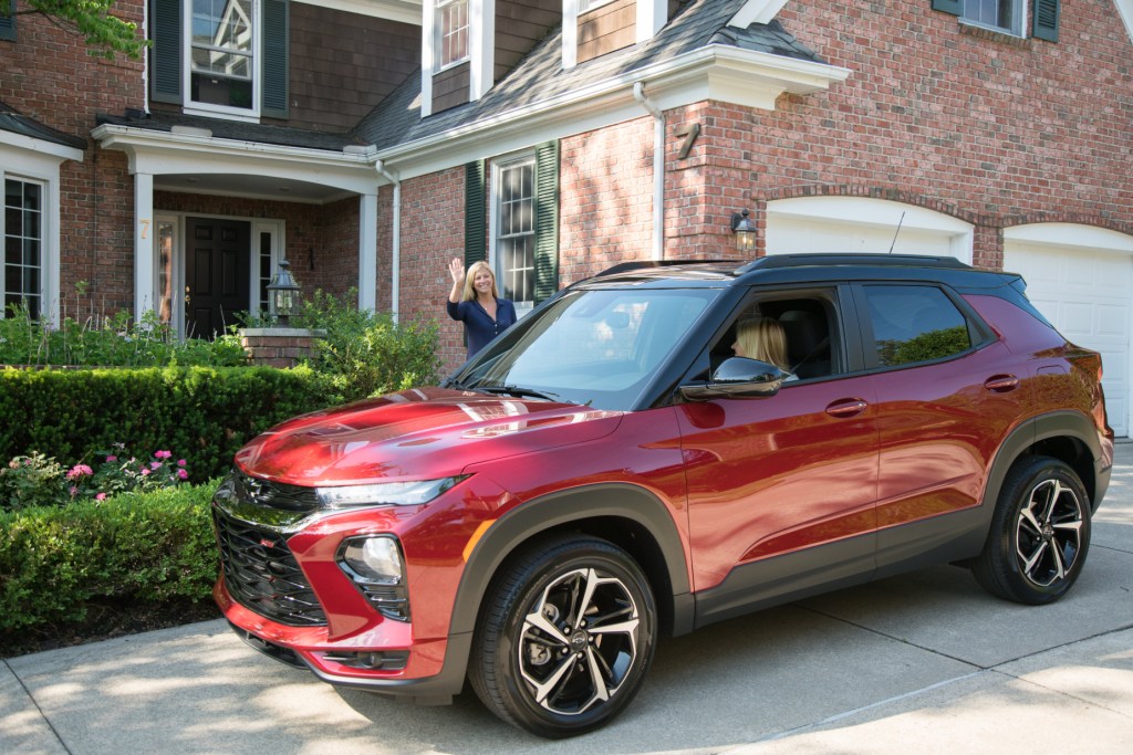 A red 2021 Chevy Trailblazer parked in a driveway