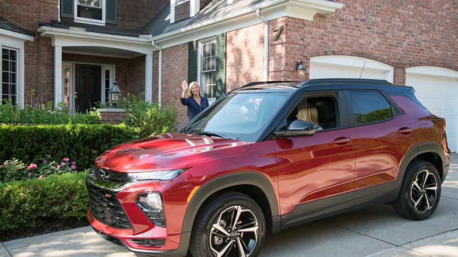 A red 2021 Chevy Trailblazer parked in a driveway