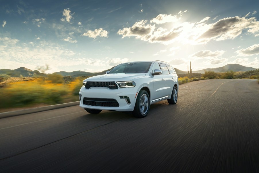 2021 Dodge Durango driving down a sunny road