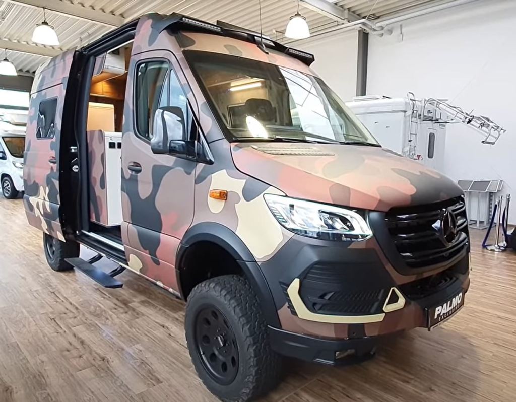 A camouflaged 2021 Hymer Grand Canyon RSX offroad RV 